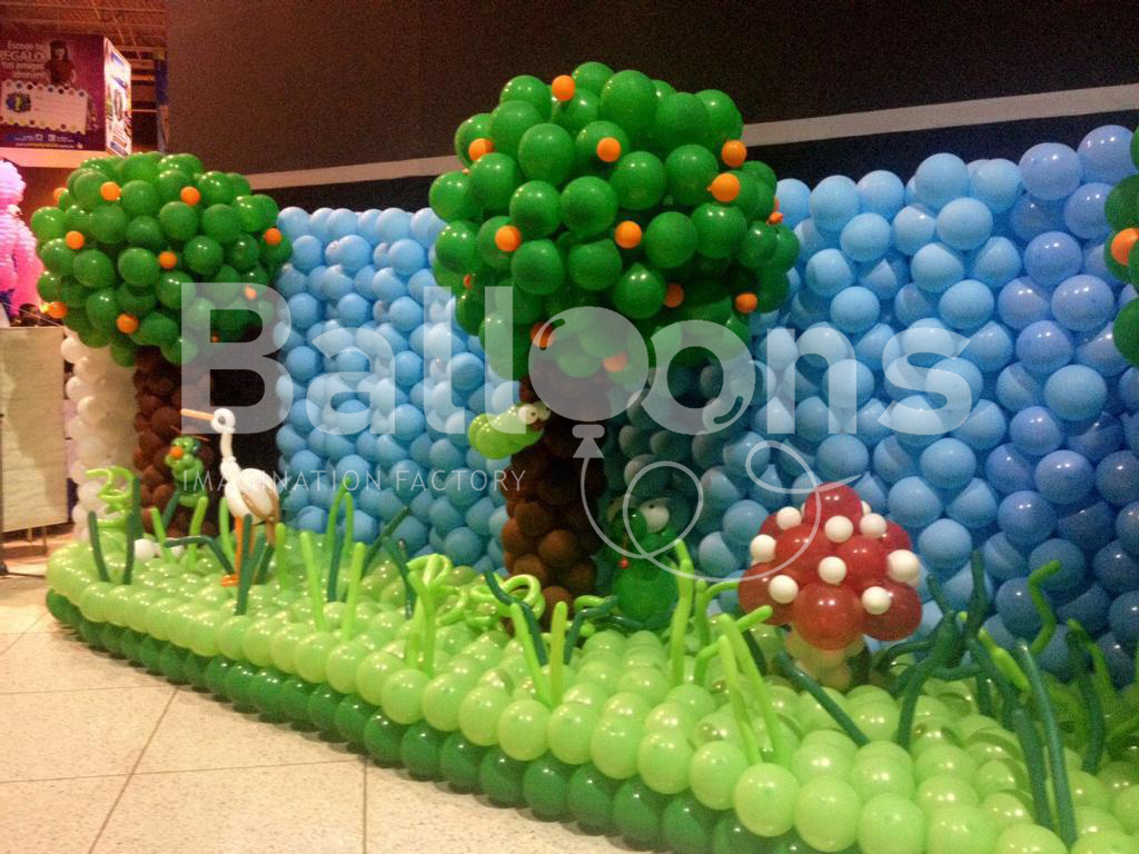 Fachada de globos con arboles